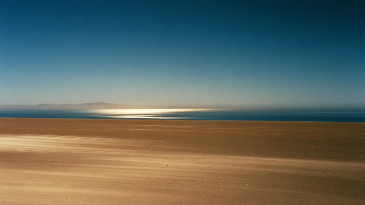 A faint mirage of water shimmering on the desert horizon